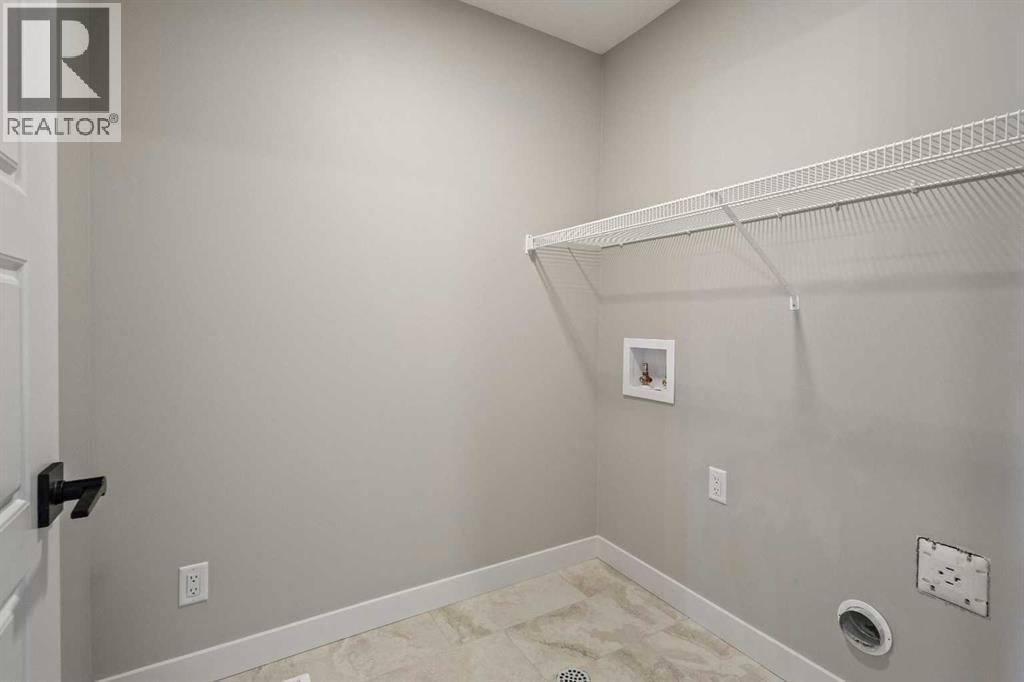 65 Amblefield Heights Nw, Calgary, Alberta  T3P 2K1 - Photo 17 - A2288185