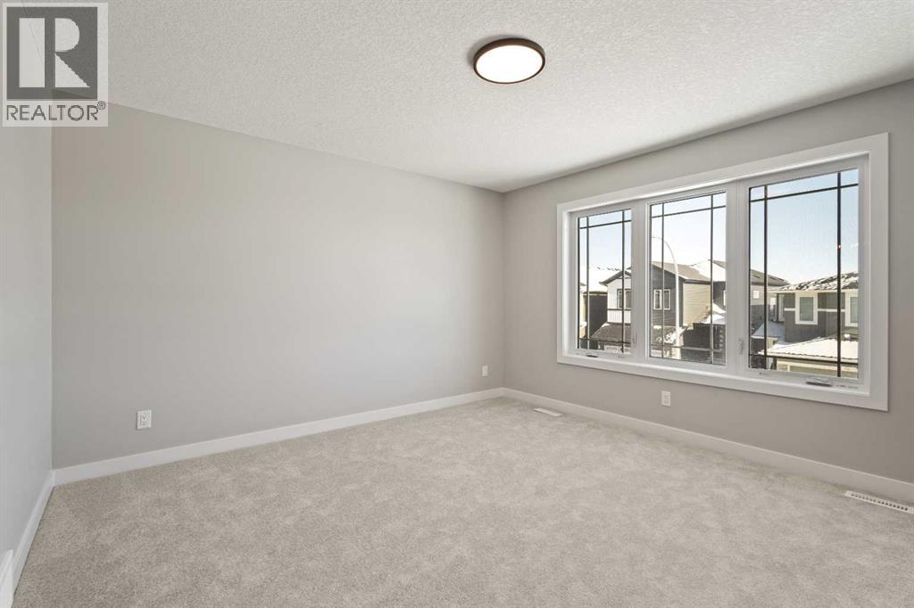 65 Amblefield Heights Nw, Calgary, Alberta  T3P 2K1 - Photo 18 - A2288185