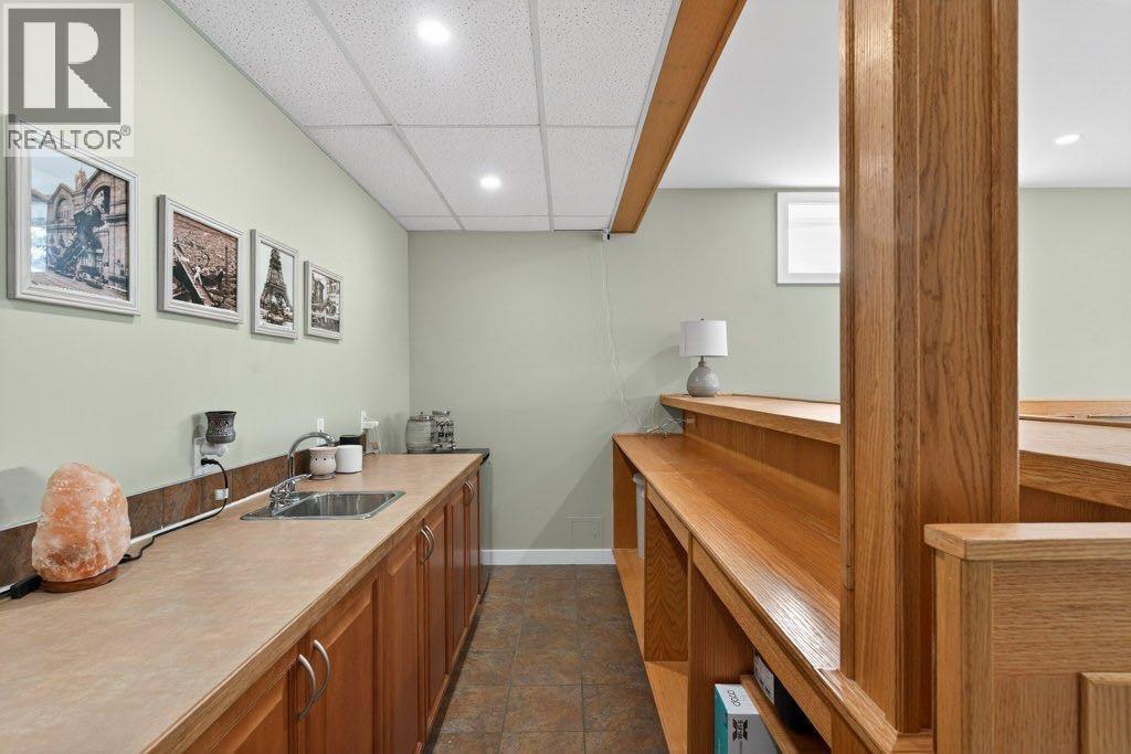 311 Crystal Shores View, Okotoks, Alberta  T1S 2H9 - Photo 30 - A2294700