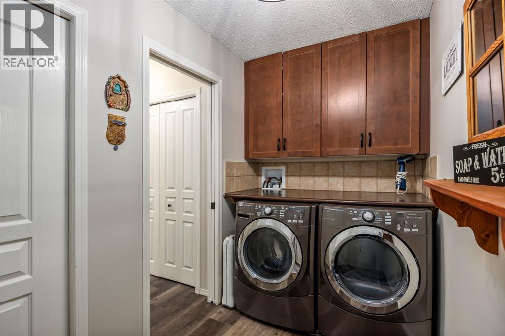 1306 Prairie Springs Park SW, Airdrie, Alberta  T4B 0E8 - Photo 30 - A2288784