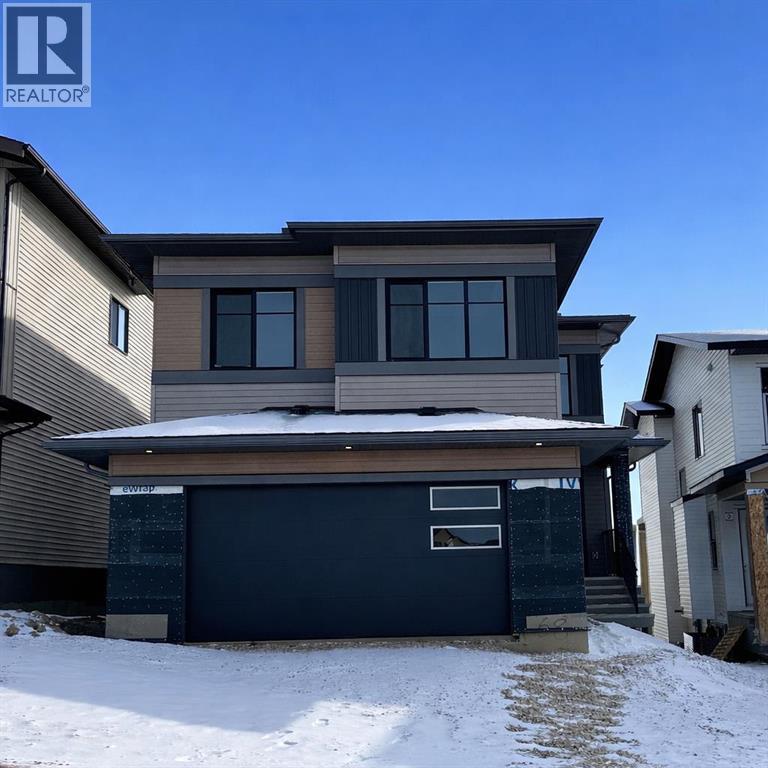 68 Heritage Ridge, Cochrane, Alberta  T4C 2J8 - Photo 2 - A2289865