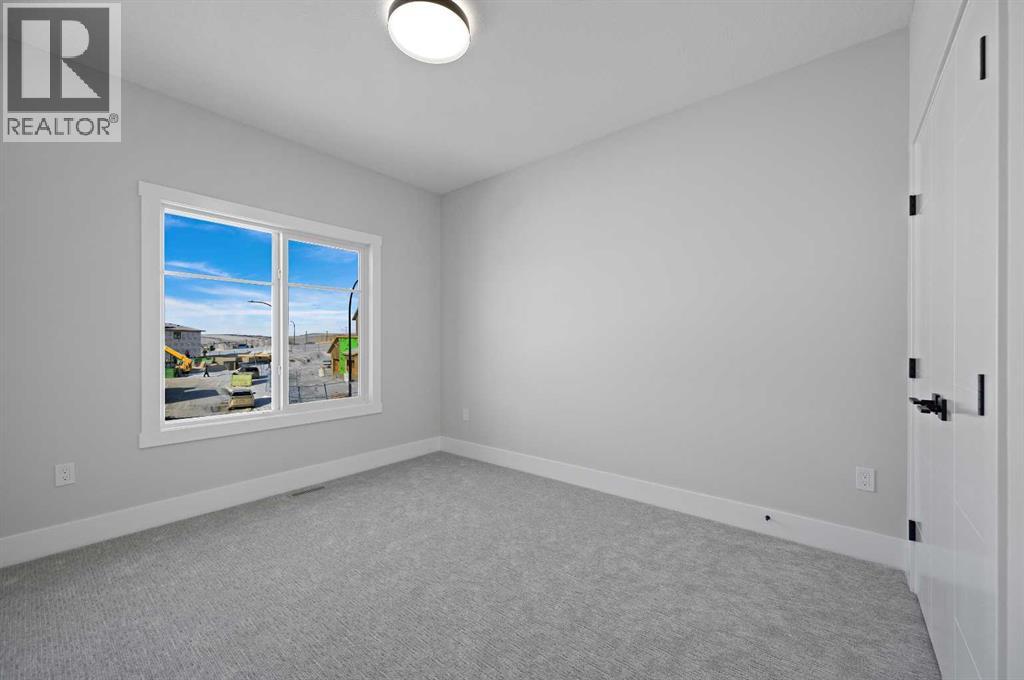 68 Heritage Ridge, Cochrane, Alberta  T4C 2J8 - Photo 25 - A2289865