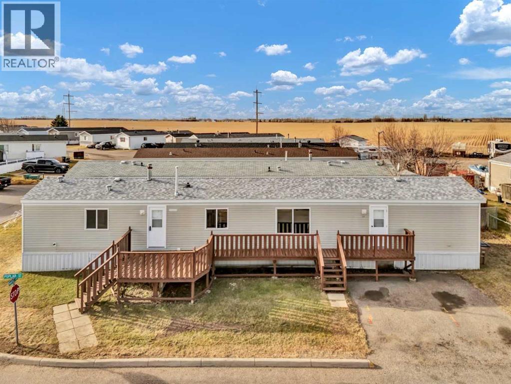 <div class="slider-price">$147,500.00</div><p>57 Maple Drive W, Brooks, Alberta</p>