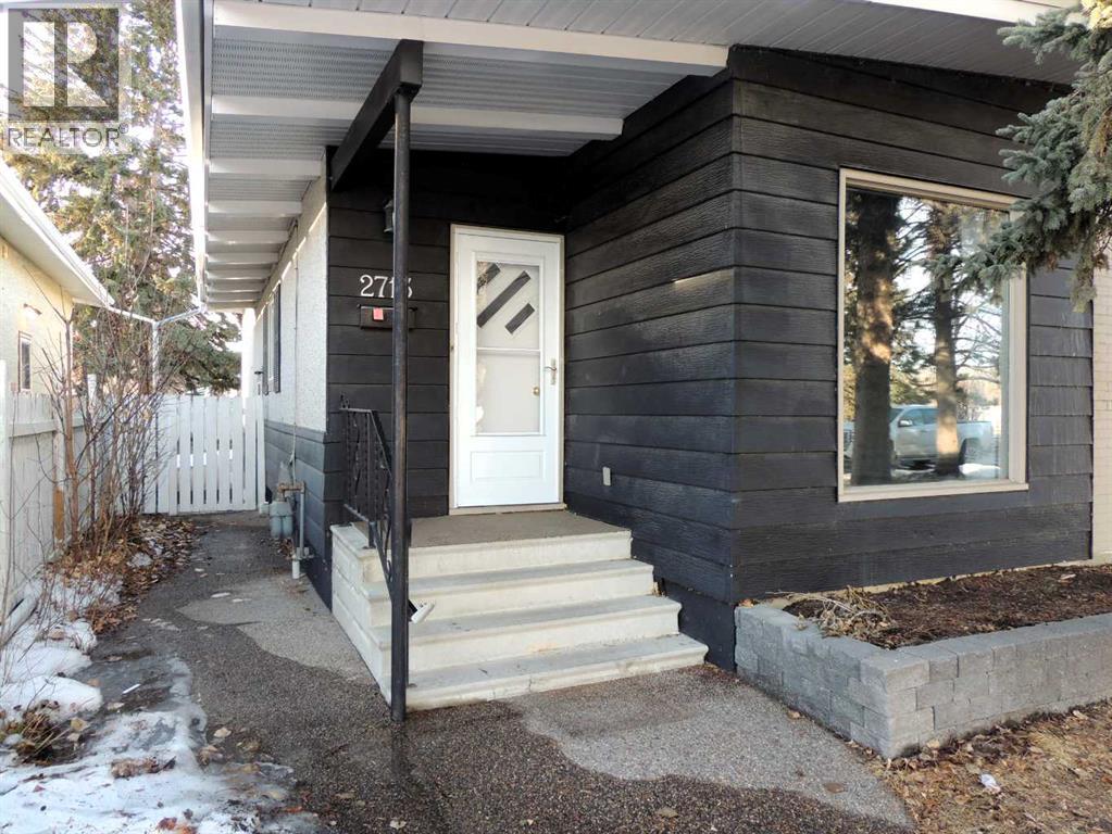 2713 Canmore Road NW, Calgary, Alberta  T2M 4J6 - Photo 4 - A2278776