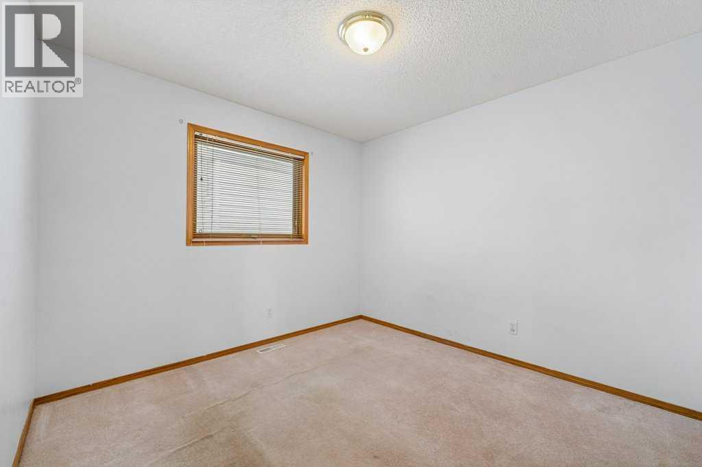 9119 Scurfield Drive NW, Calgary, Alberta  T3L 1X7 - Photo 29 - A2293959