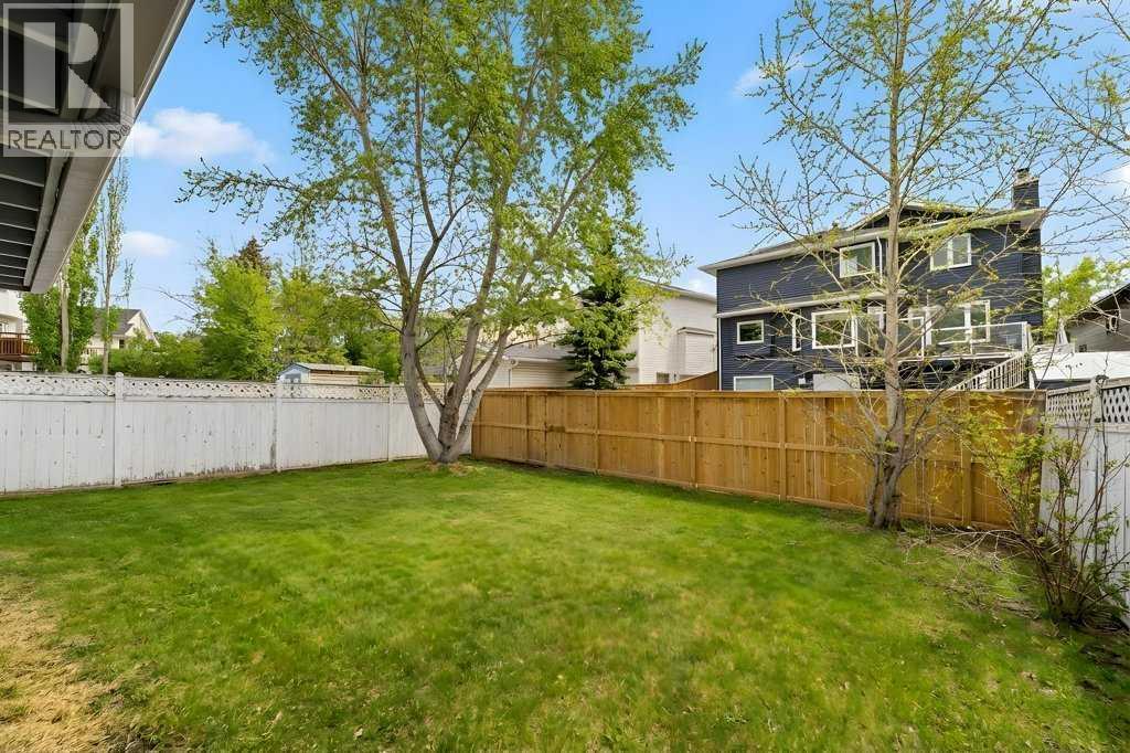 9119 Scurfield Drive NW, Calgary, Alberta  T3L 1X7 - Photo 5 - A2293959