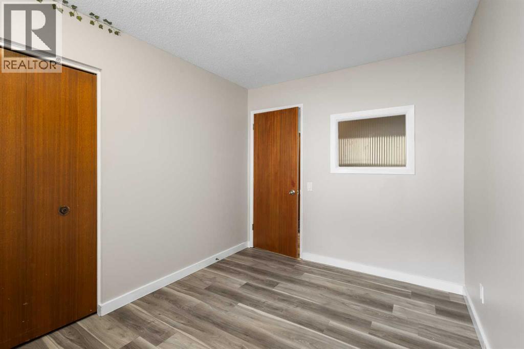 7604 Hunterfield Road Nw, Calgary, Alberta  T2K 4L3 - Photo 12 - A2294509