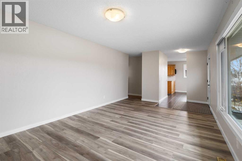 7604 Hunterfield Road Nw, Calgary, Alberta  T2K 4L3 - Photo 4 - A2294509