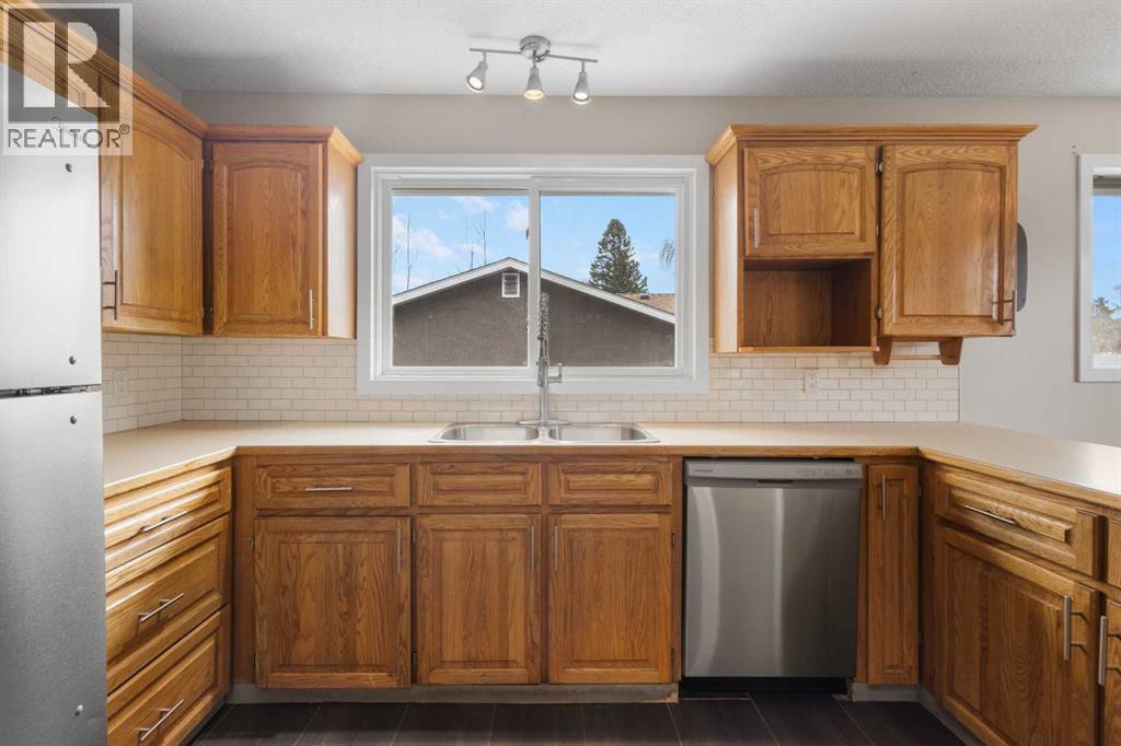 7604 Hunterfield Road Nw, Calgary, Alberta  T2K 4L3 - Photo 10 - A2294509