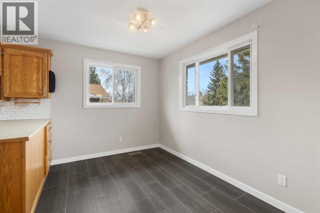 7604 Hunterfield Road Nw, Calgary, Alberta  T2K 4L3 - Photo 5 - A2294509