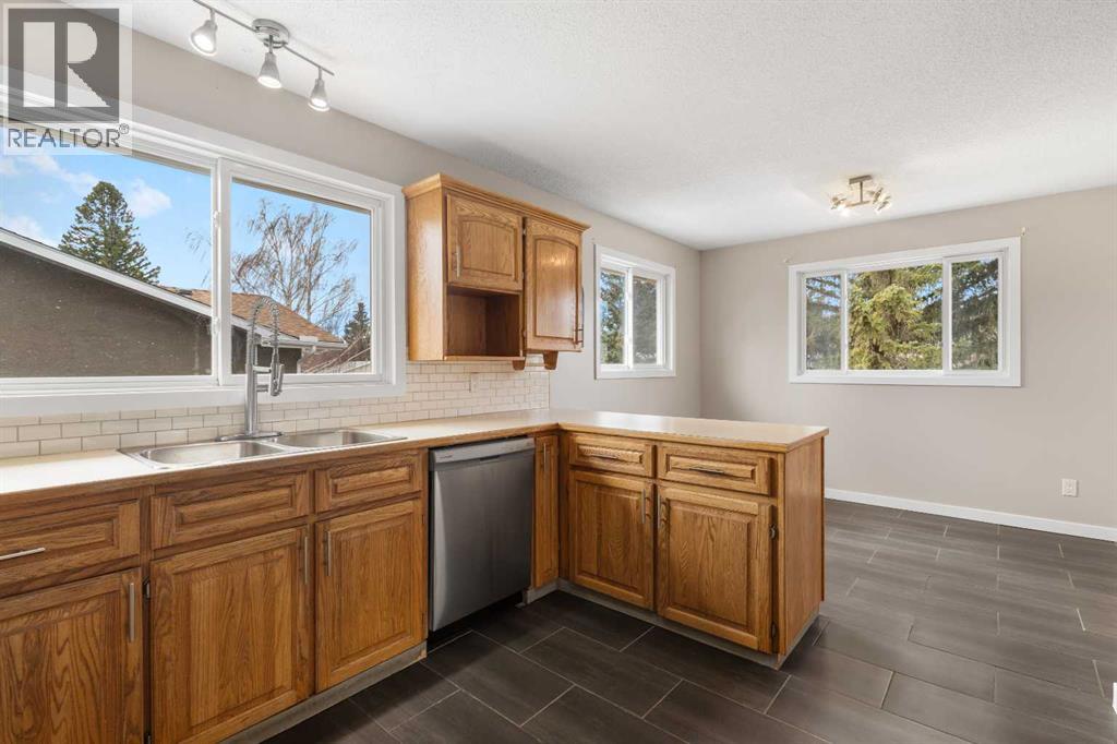 7604 Hunterfield Road Nw, Calgary, Alberta  T2K 4L3 - Photo 9 - A2294509