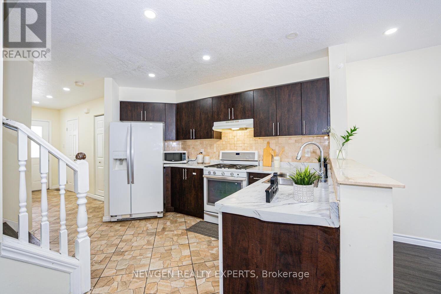 1465 Old Zeller Drive, Kitchener, Ontario  N2A 4M8 - Photo 10 - X12902204