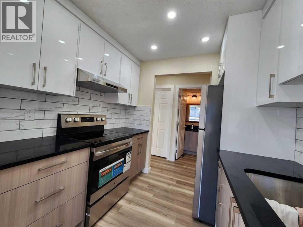 4, 6424 4 Street Ne, Calgary, Alberta  T2K 5M8 - Photo 9 - A2287164