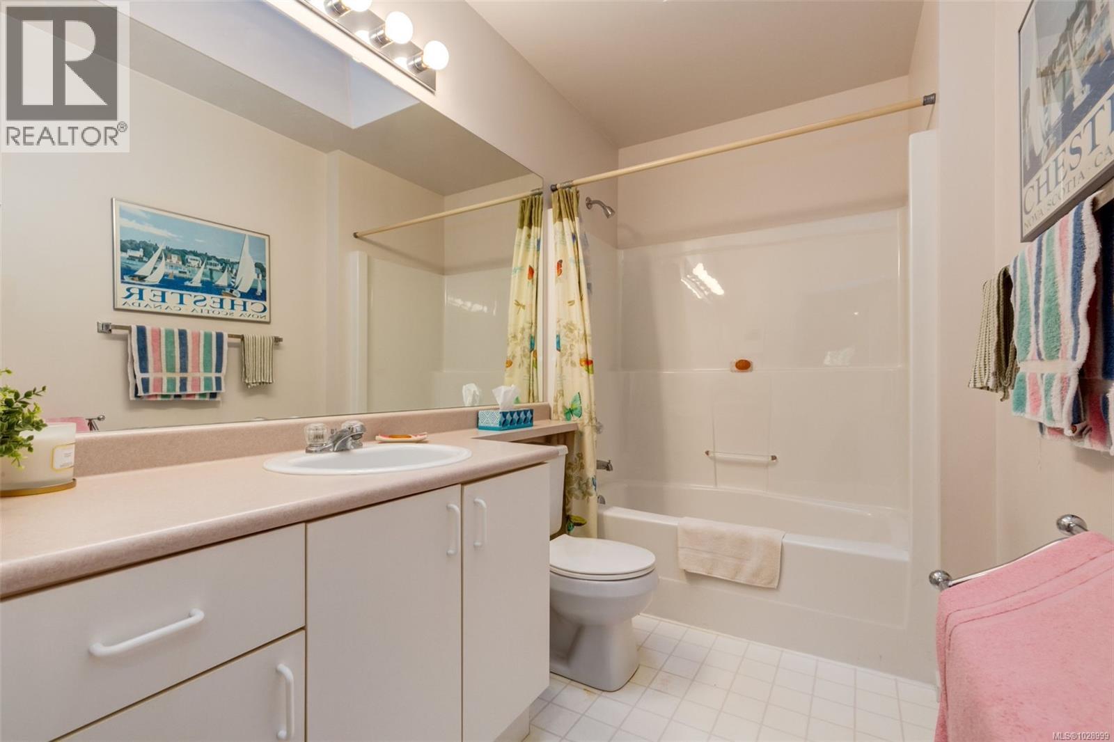 201 440 Schley Pl, Qualicum Beach, British Columbia  V9K 2M5 - Photo 16 - 1028999