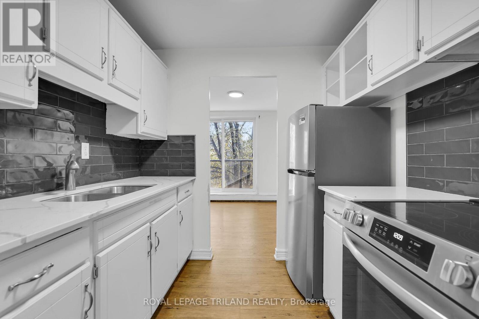 301 - 294 Saulsbury Street, Strathroy-Caradoc, Ontario  N7G 2B2 - Photo 2 - X12902670