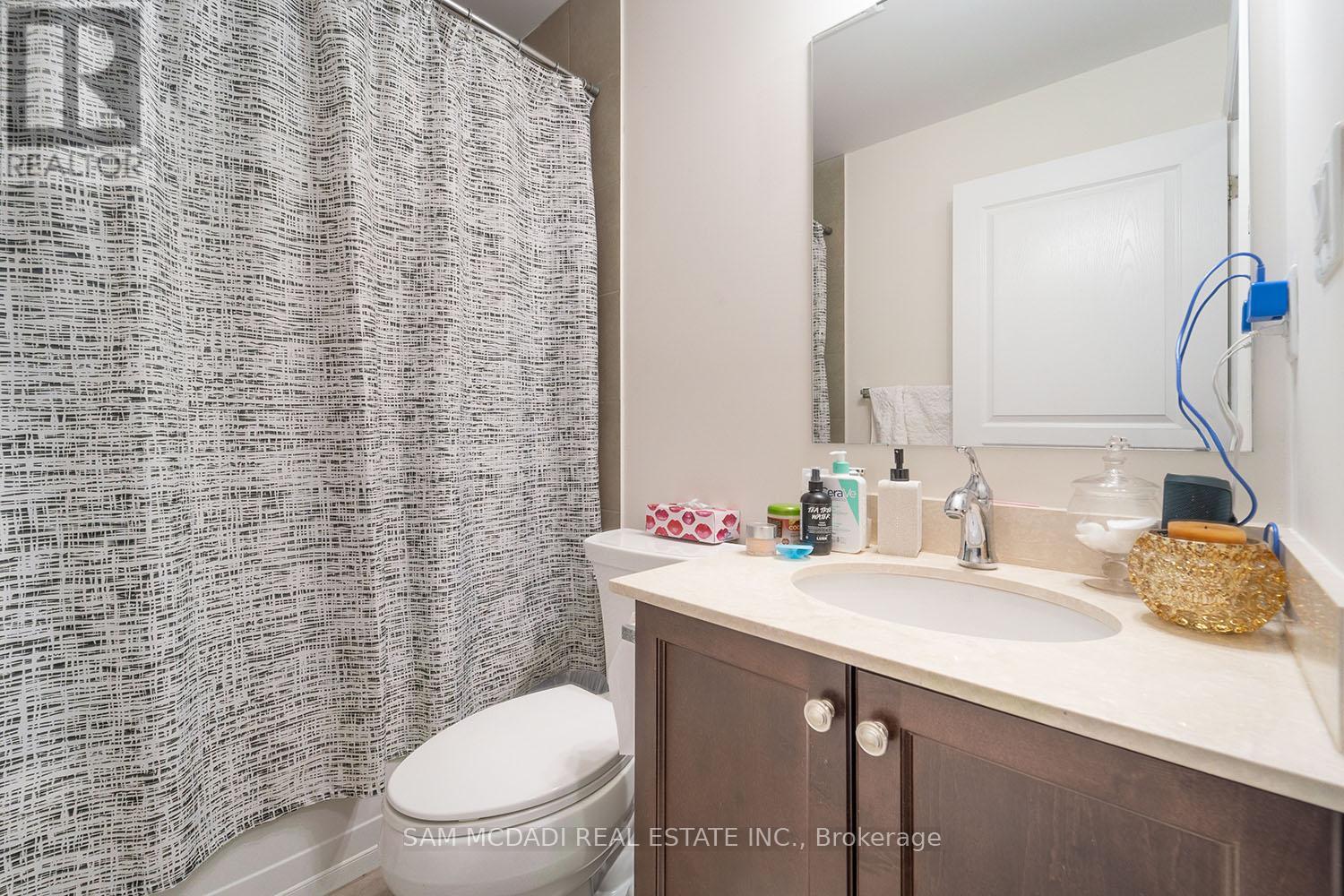 234 - 3170 Erin Mills Parkway, Mississauga, Ontario  L5L 1W8 - Photo 2 - W12902796