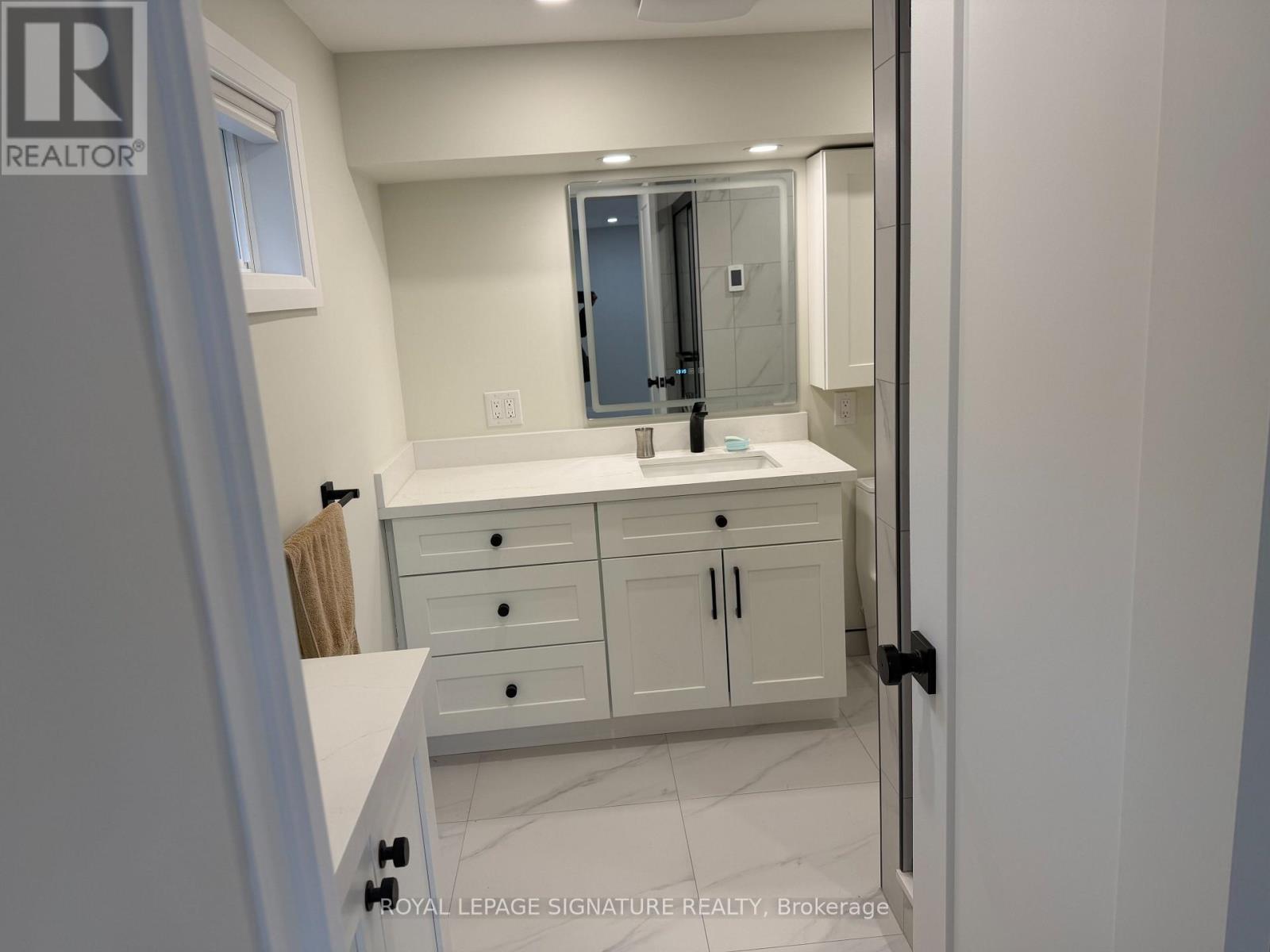 Shared Basement - 9 Breadner Drive, Toronto, Ontario  M9R 3M3 - Photo 8 - W12902948