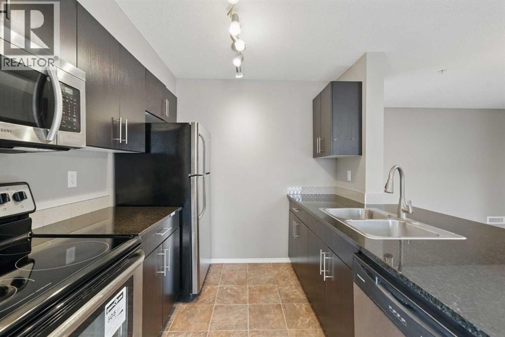 1240, 81 Legacy Boulevard SE, Calgary, Alberta  T2X 2B9 - Photo 7 - A2208088