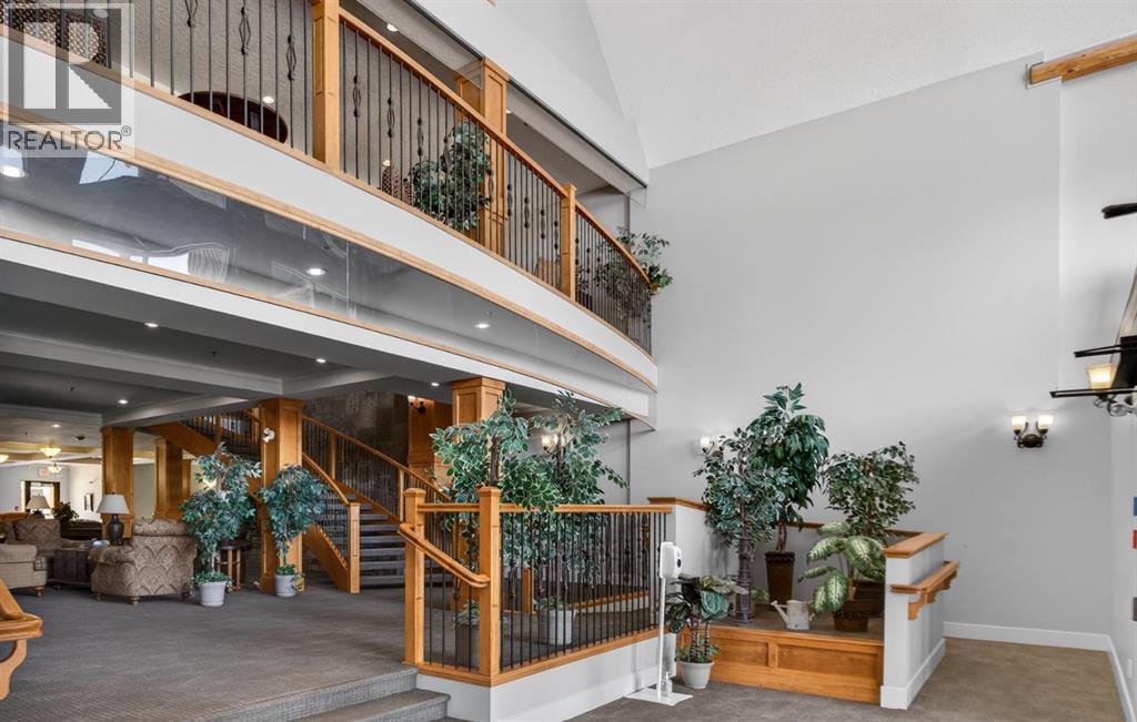 203, 77 George Fox Trail, Cochrane, Alberta  T4C 0N1 - Photo 4 - A2295000