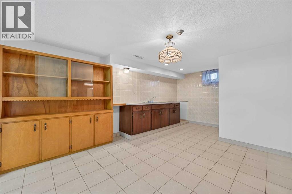 7228 Huntridge Hill Ne, Calgary, Alberta  T2K 4A5 - Photo 28 - A2289367