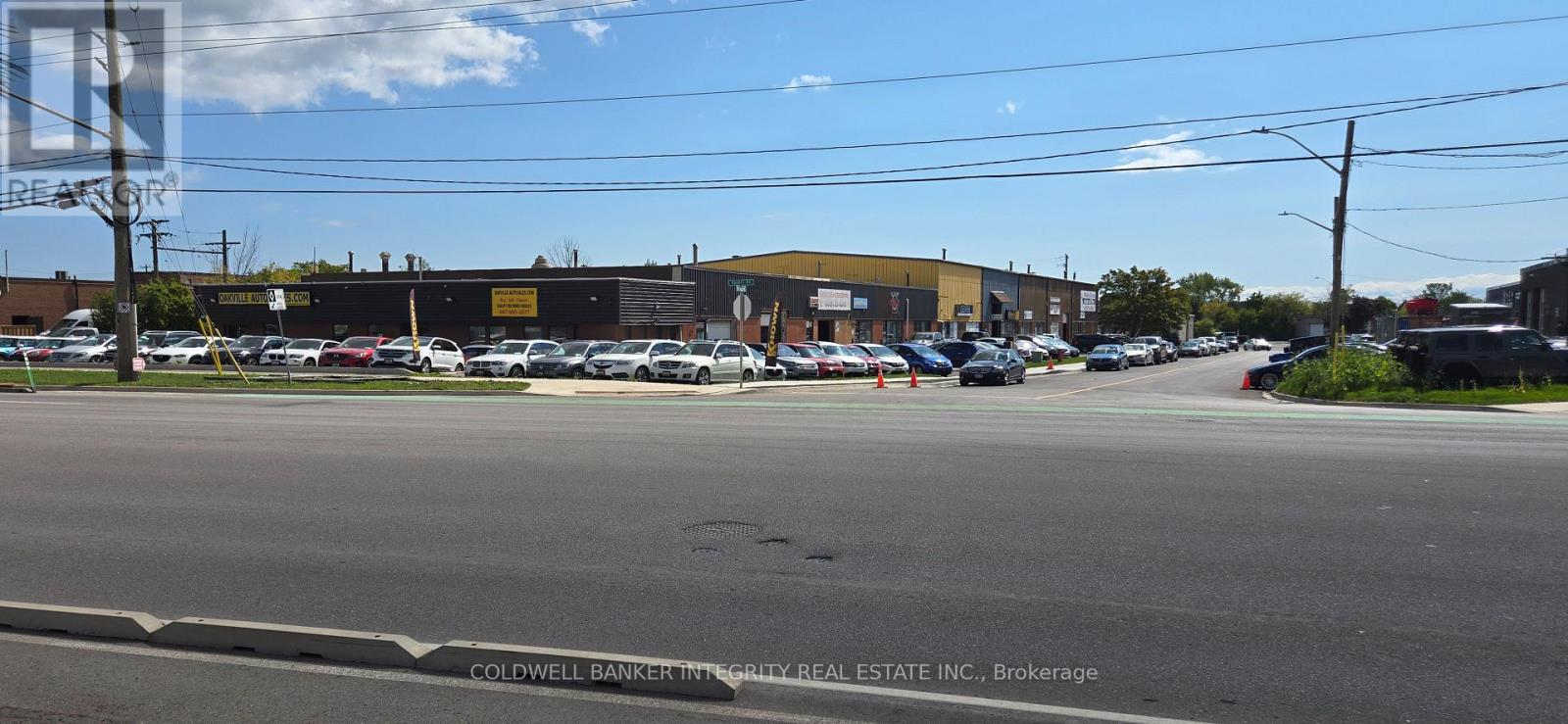 1490 Speers Road, Oakville, Ontario  L6L 2X6 - Photo 2 - W12397149