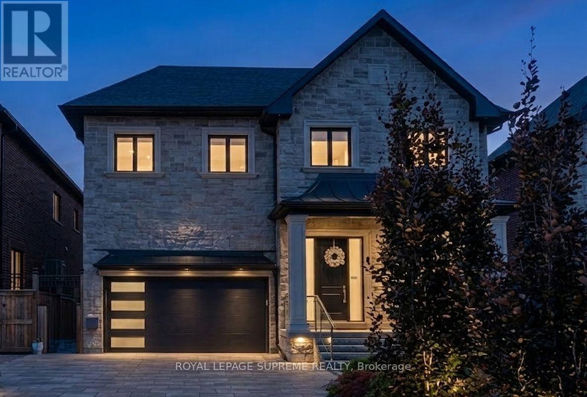 <div class="slider-price">$2,199,900</div><p>52b Cork Avenue, Toronto, Ontario</p>