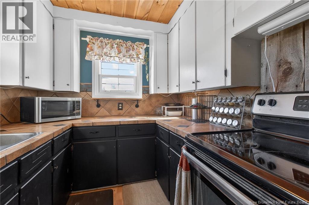 7327 Route 126 Route, Harcourt, New Brunswick  E4T 2Y4 - Photo 8 - NB135216