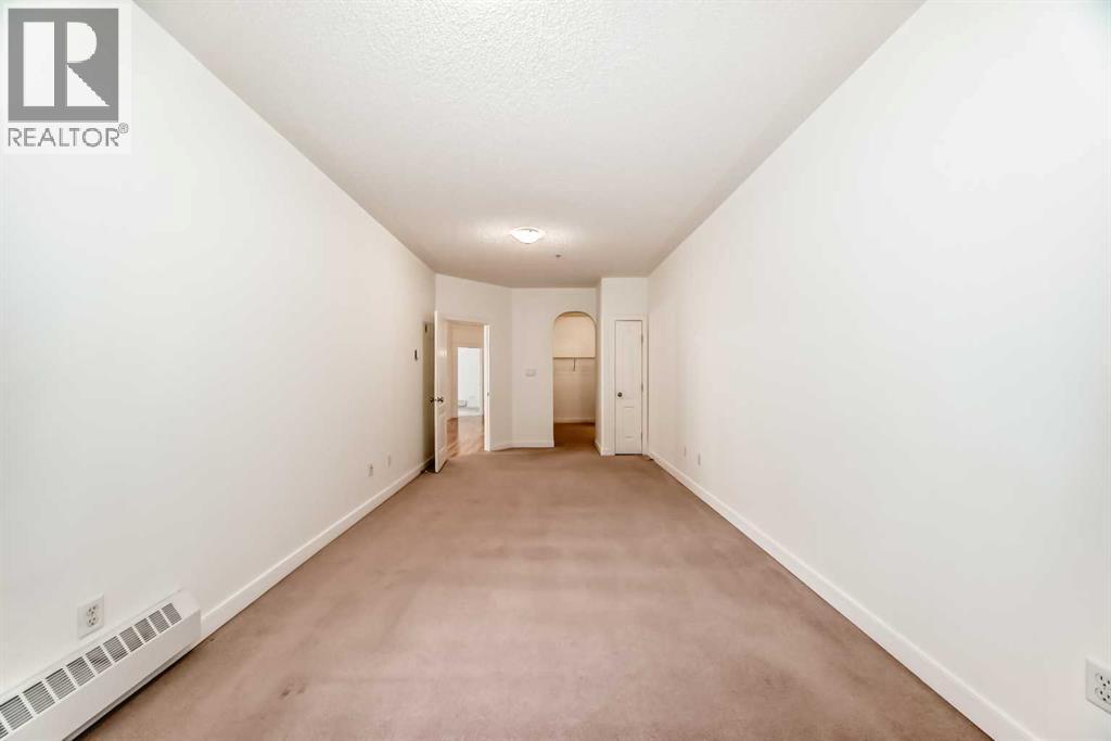 203, 20 Discovery Ridge Close Sw, Calgary, Alberta  T3H 5X4 - Photo 19 - A2294947