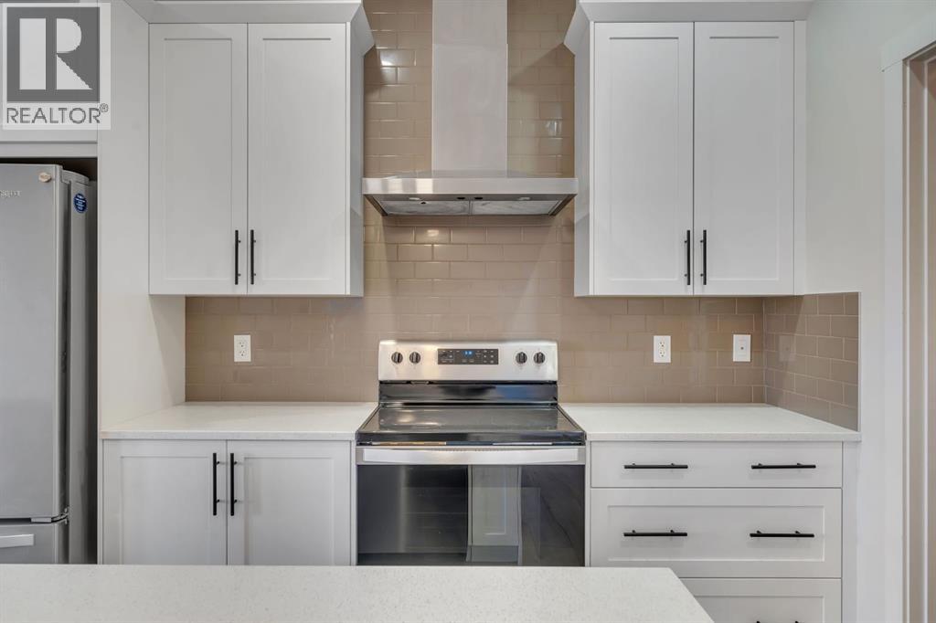 1489 Bayview Point SW, Airdrie, Alberta  T4B 5K1 - Photo 11 - A2291410