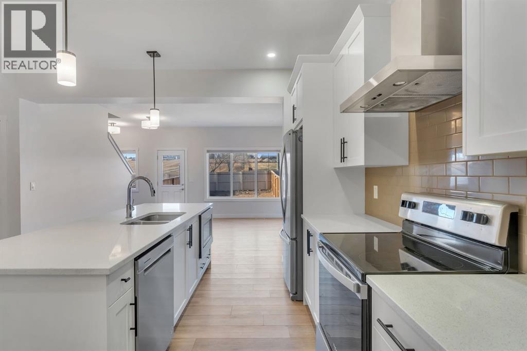 1489 Bayview Point SW, Airdrie, Alberta  T4B 5K1 - Photo 12 - A2291410