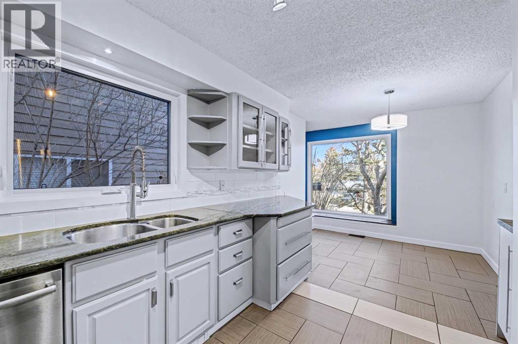 188 Bernard Drive Nw, Calgary, Alberta  T3K 2B7 - Photo 7 - A2287043