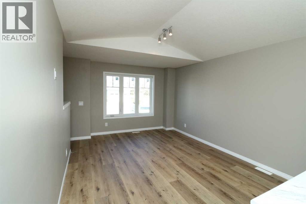 447 Henricks Drive, Irricana, Alberta  T0M 1G0 - Photo 4 - A2287250