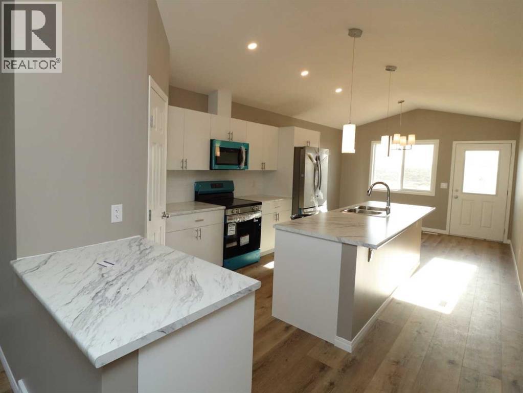 447 Henricks Drive, Irricana, Alberta  T0M 1G0 - Photo 5 - A2287250