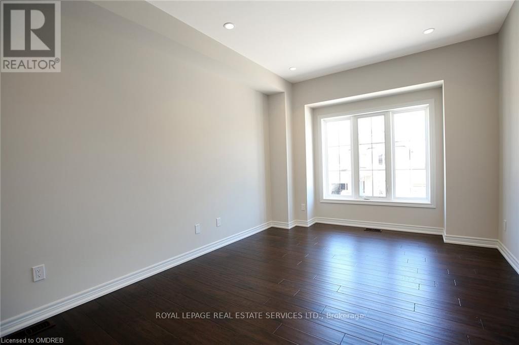 2307 Natasha Circle, Oakville, Ontario  L6M 1P2 - Photo 4 - W12904012