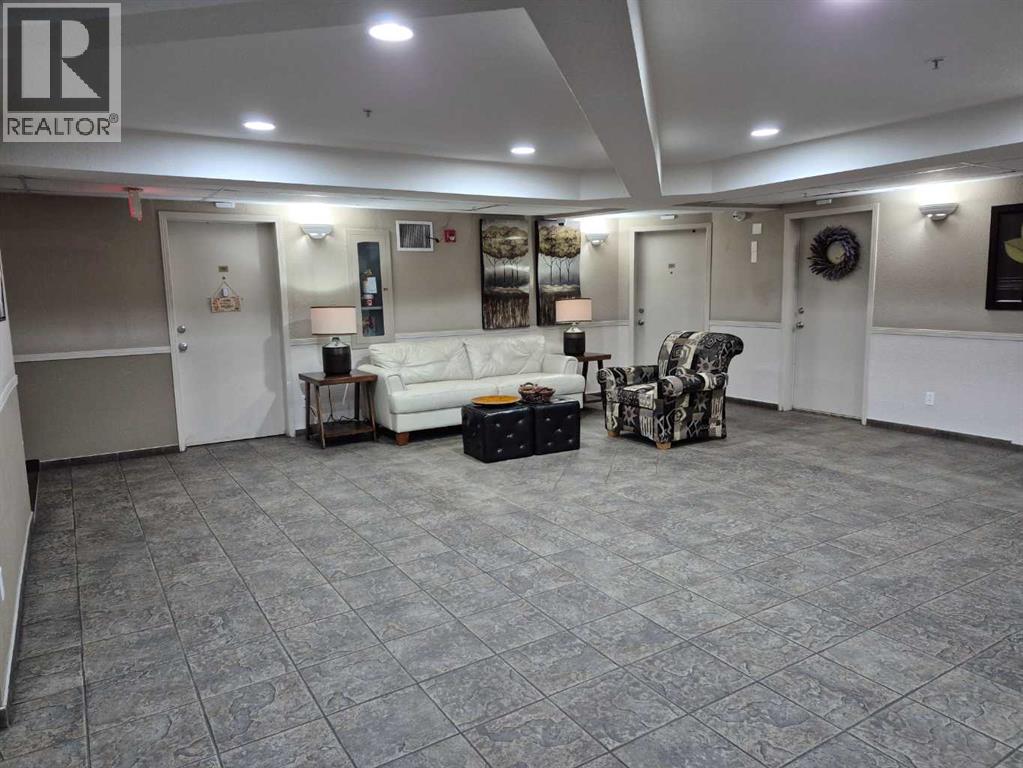 1117, 12 Cimarron Common, Okotoks, Alberta  T1S 1G6 - Photo 3 - A2287061