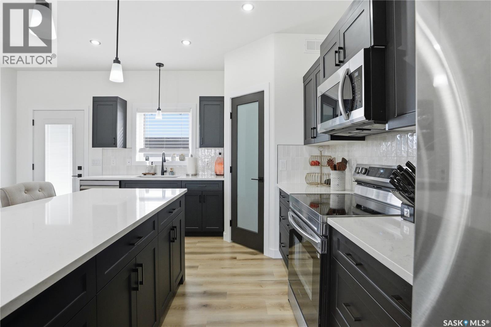 827 Woods Crescent, Warman, Saskatchewan  S0K 4S4 - Photo 9 - SK030952