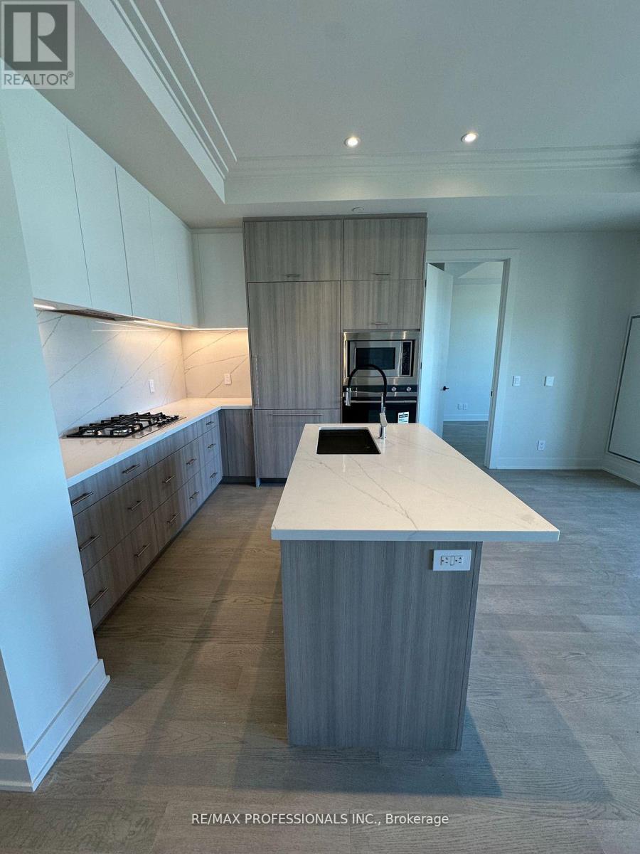 410 - 123 Maurice Drive, Oakville, Ontario  L6K 2W6 - Photo 3 - W12904822