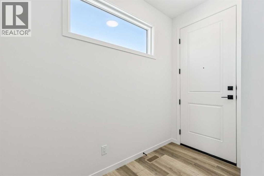 75 Annette Rise Nw, Calgary, Alberta  T3R 2K8 - Photo 4 - A2289160