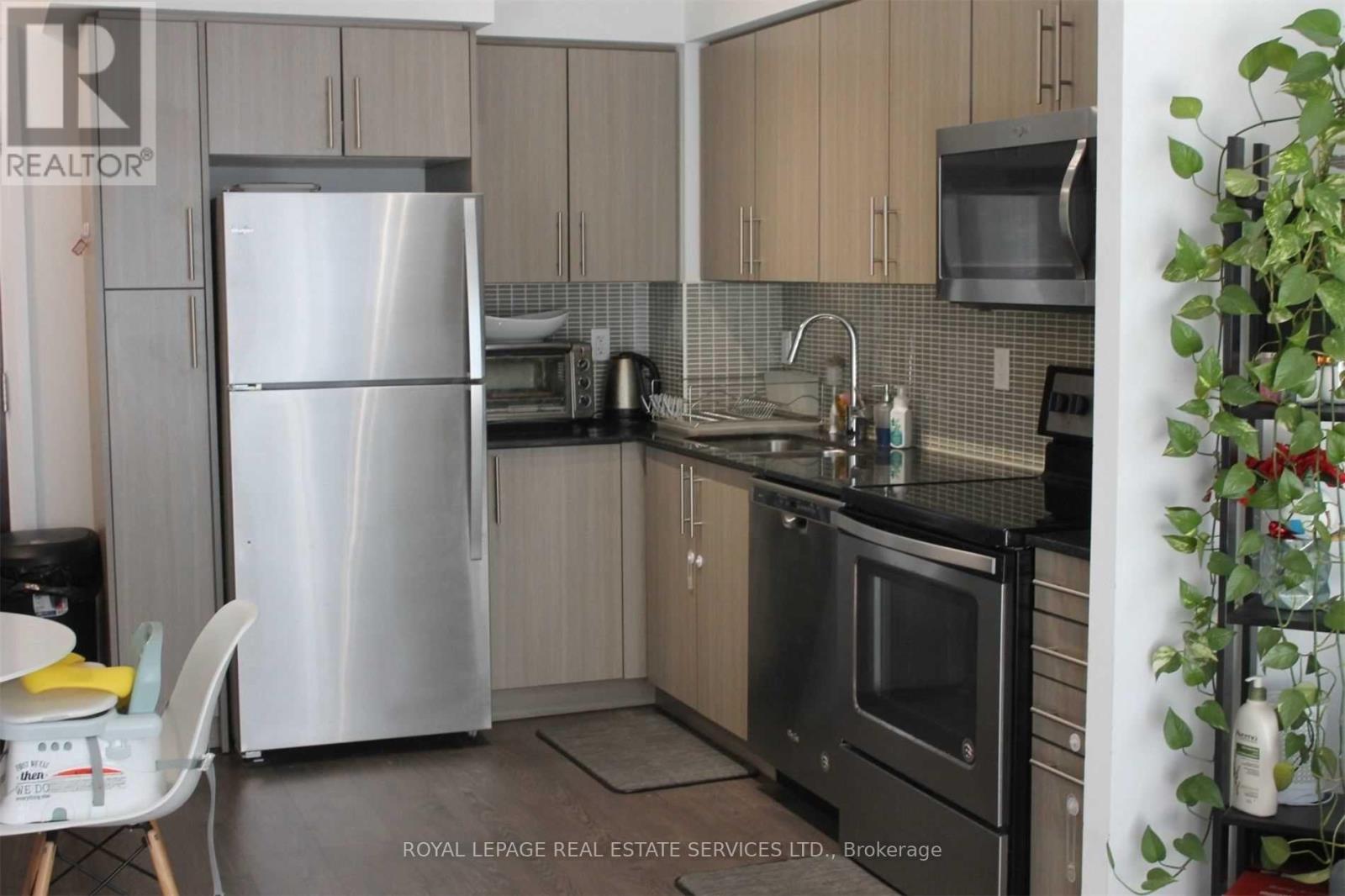 1513 - 55 Speers Road, Oakville, Ontario  L6K 3R6 - Photo 4 - W12905370