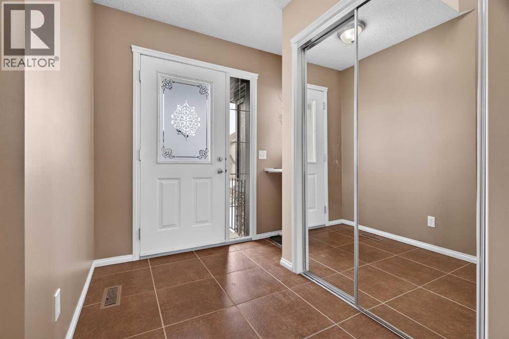 7 Cougar Ridge Bay Sw, Calgary, Alberta  T3H 5C4 - Photo 3 - A2288741