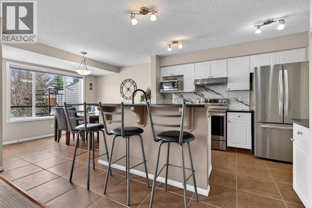 7 Cougar Ridge Bay Sw, Calgary, Alberta  T3H 5C4 - Photo 10 - A2288741