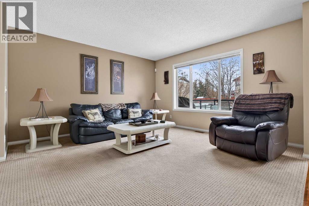 7 Cougar Ridge Bay Sw, Calgary, Alberta  T3H 5C4 - Photo 6 - A2288741