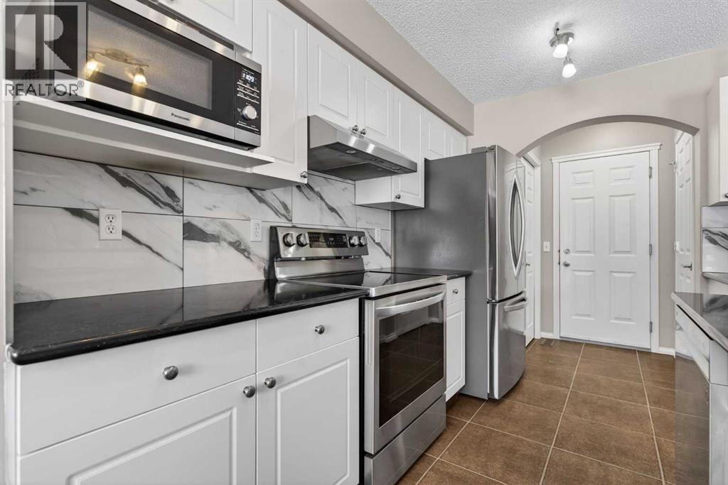 7 Cougar Ridge Bay Sw, Calgary, Alberta  T3H 5C4 - Photo 15 - A2288741