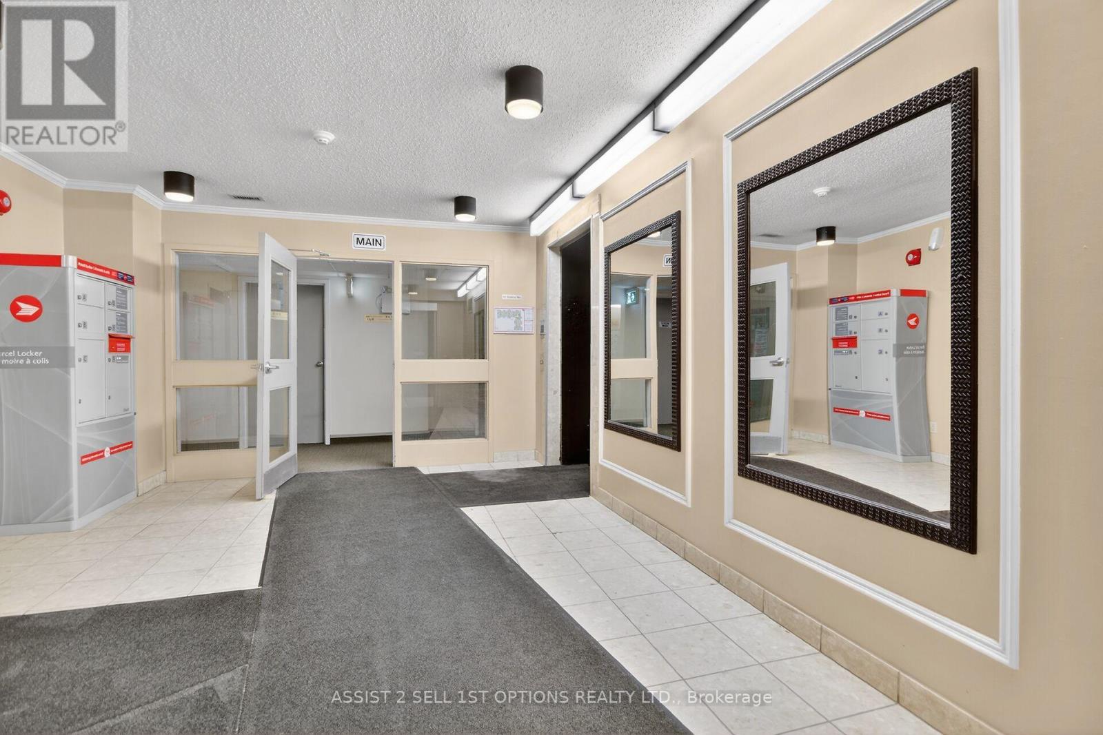 311 - 268 Lorry Greenberg Drive, Ottawa, Ontario  K1T 3K1 - Photo 2 - X12905554