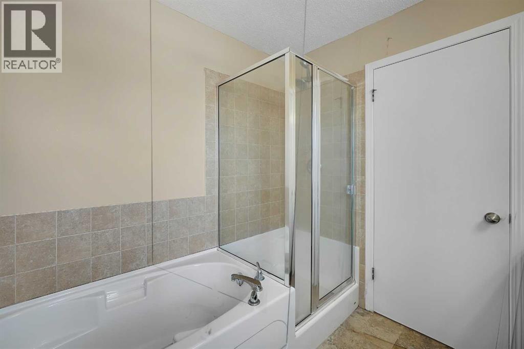 1833 New Brighton Drive, Calgary, Alberta  T2Z 4N8 - Photo 29 - A2294121