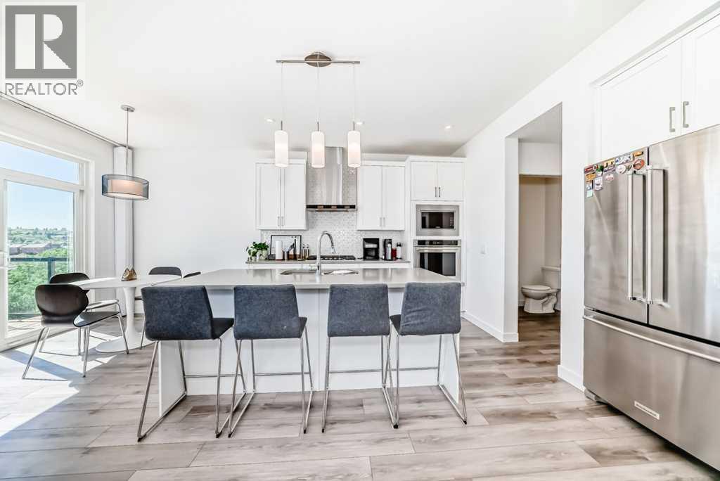 53 Spring Creek Common SW, Calgary, Alberta  T3H 6E2 - Photo 7 - A2288854