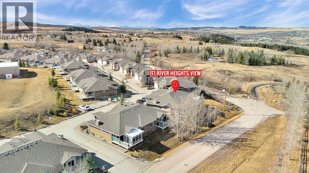 117 River Heights View, Cochrane, Alberta  T4C 0E6 - Photo 4 - A2295228