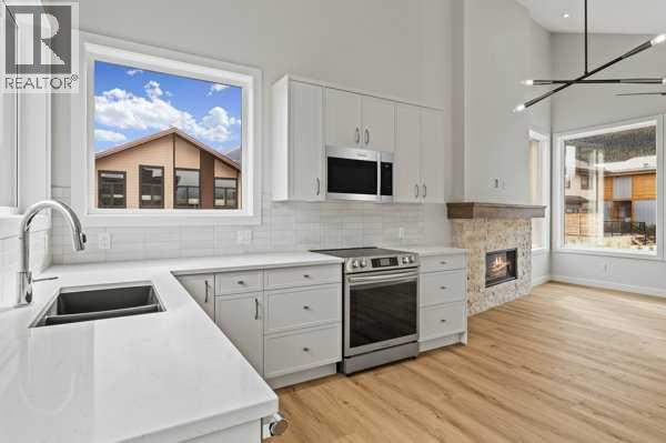 203j, 209 Stewart Creek Rise, Canmore, Alberta  T1W 0N9 - Photo 2 - A2259828