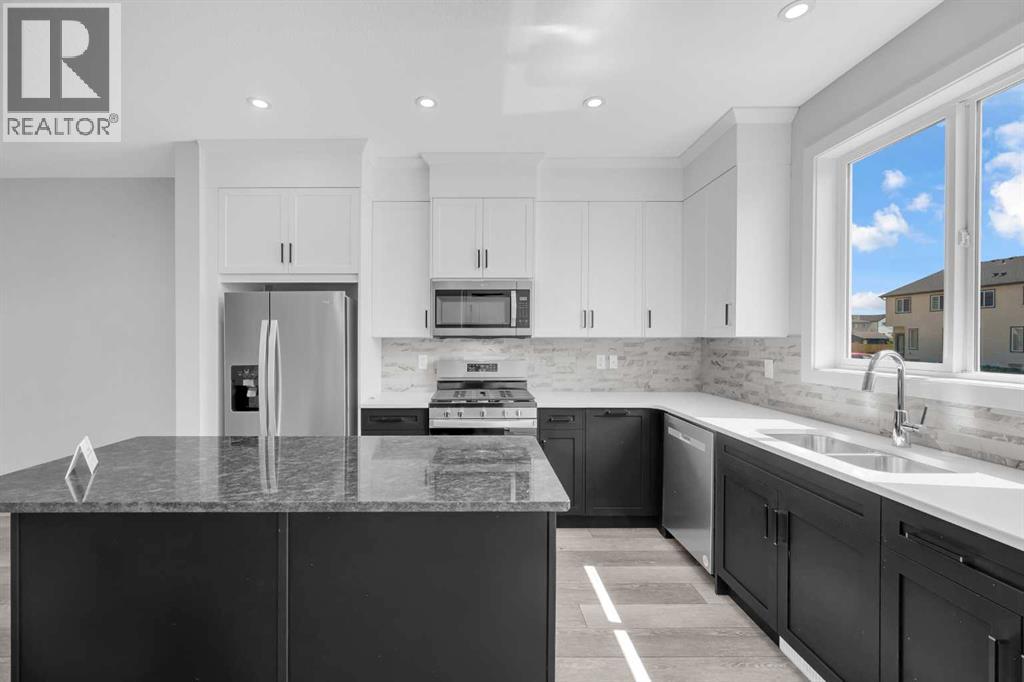 27 Amblefield Avenue NW, Calgary, Alberta  T3P 2C1 - Photo 9 - A2267569