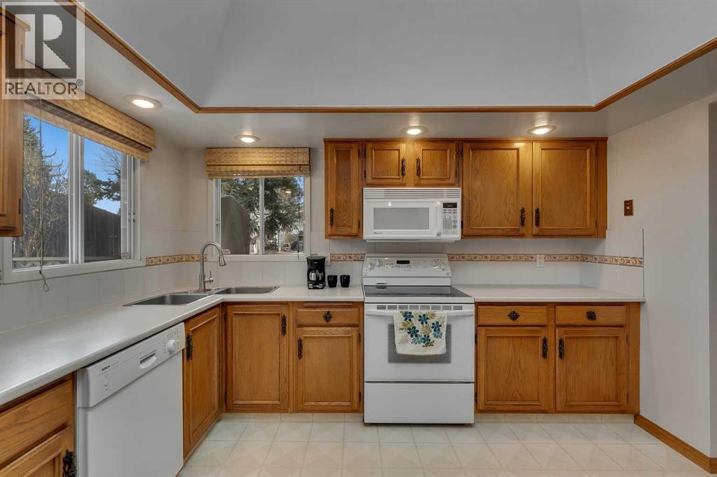 20 Woodbrook Place SW, Calgary, Alberta  T2W 3Z4 - Photo 6 - A2290893